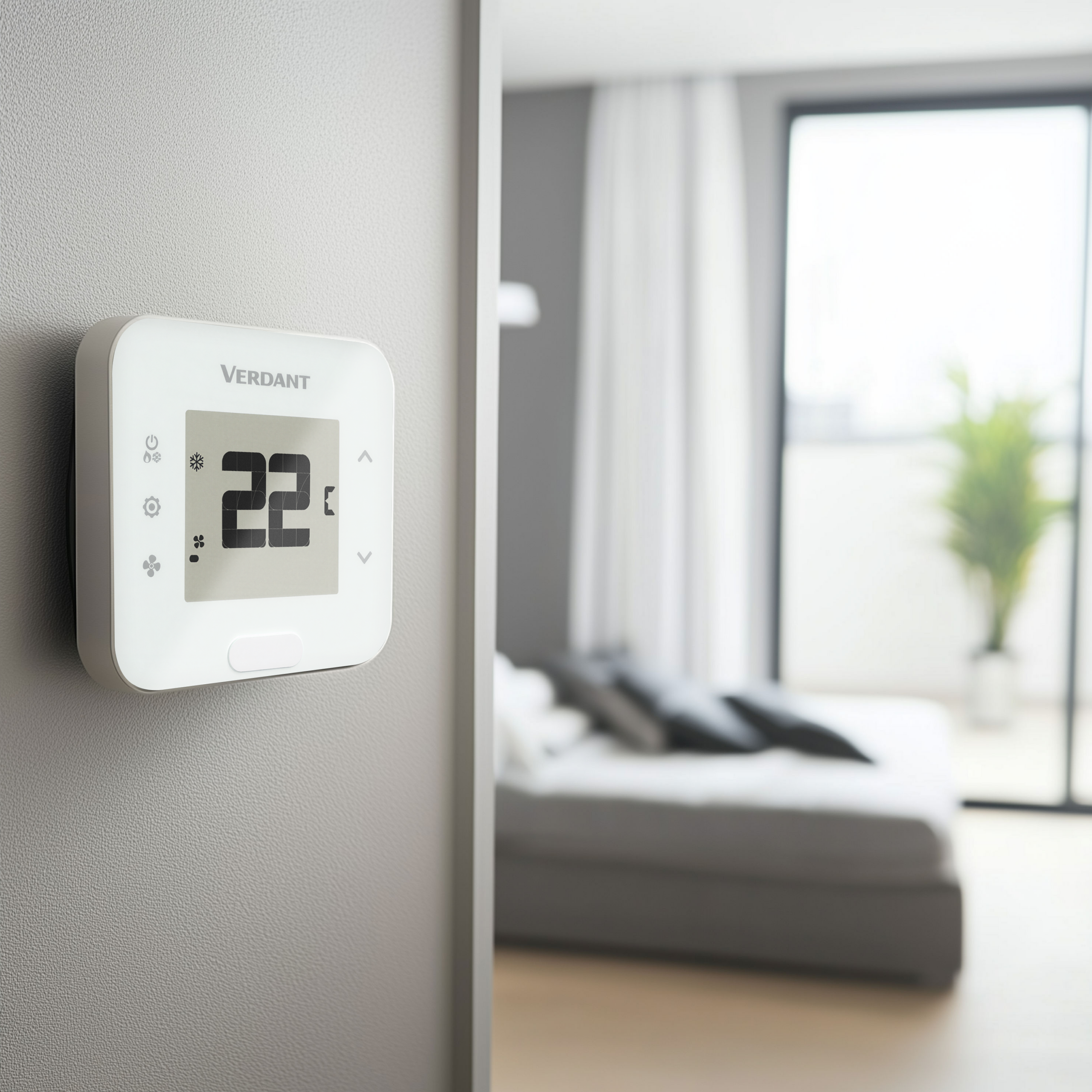 Hotel guest room with the Verdant LX thermostat on the wall