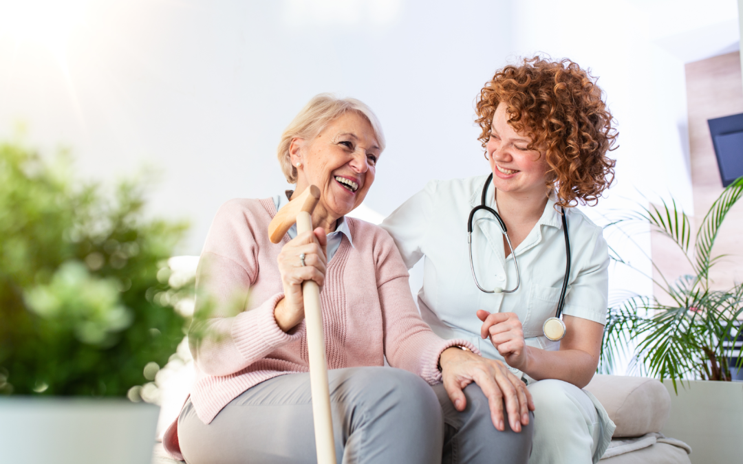 Senior living facility where an employee is doing a medical checkup on a senior.
